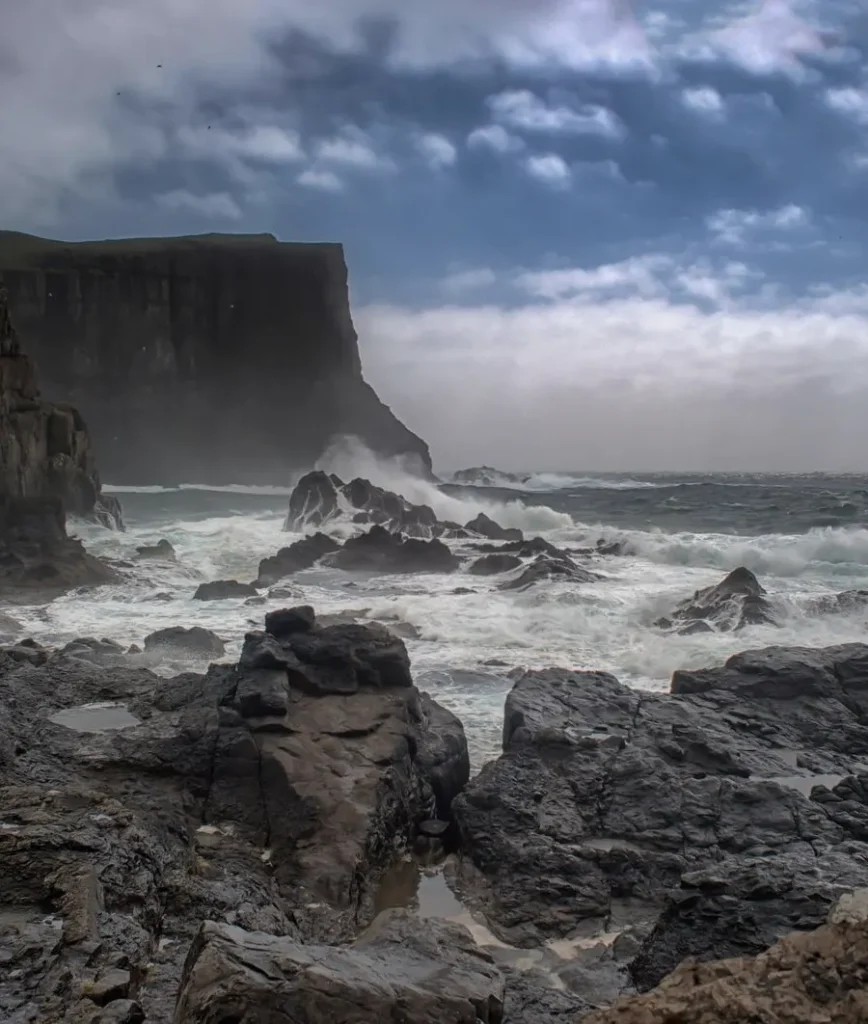 Waves breaking against a rocky coastline